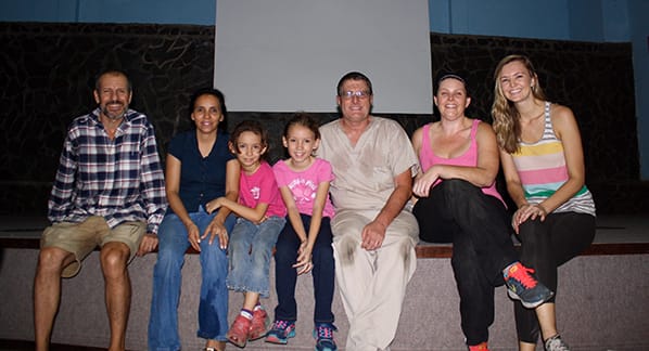 Dr. Bryan & Staff sitting with family he has helped in Nicaragua